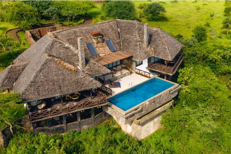 Main lodge building at Lake Manyara Kilimamoja Lodge surrounded by greenery