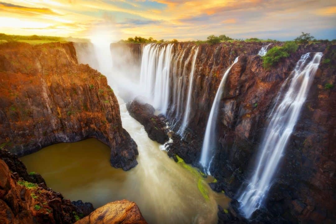 Victoria Falls on the Zimbabwe side with water plunging into the Zambezi Gorge